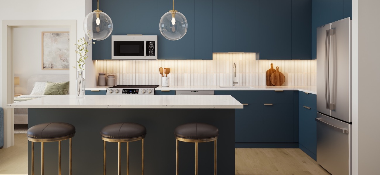 kitchen with ample counter-space, modern appliances and bright lighting