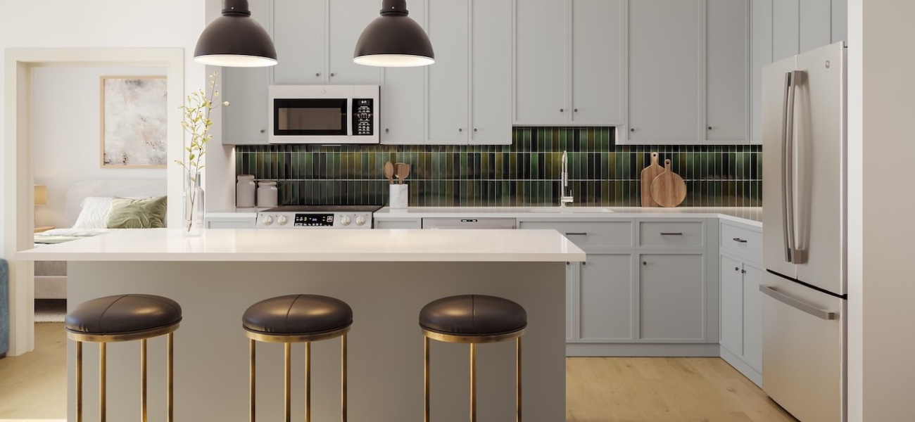 kitchen with ample counter-space, modern appliances and bright lighting