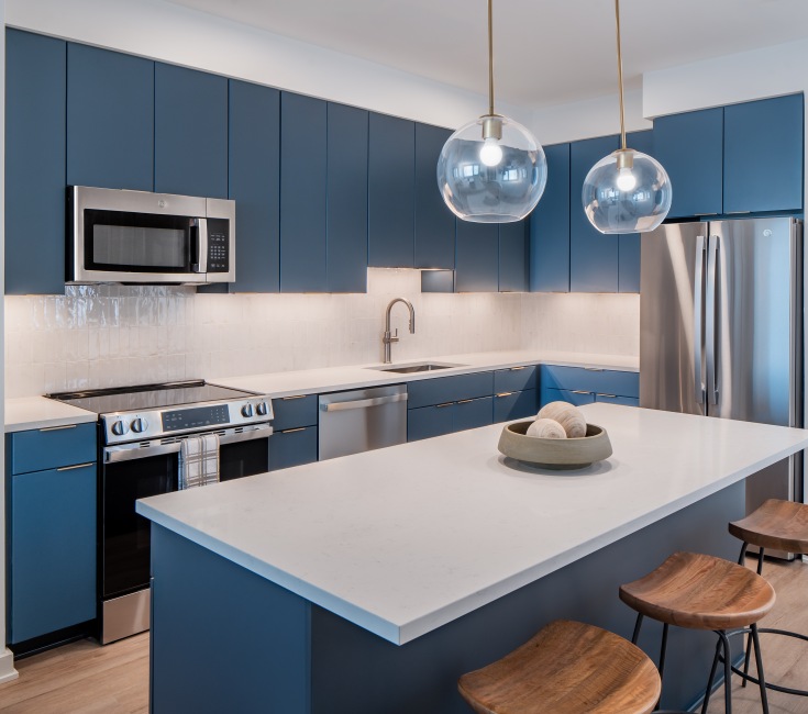 Two finish levels available, blue kitchen cabinets 